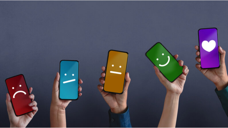 hands with raise phones user experience concept