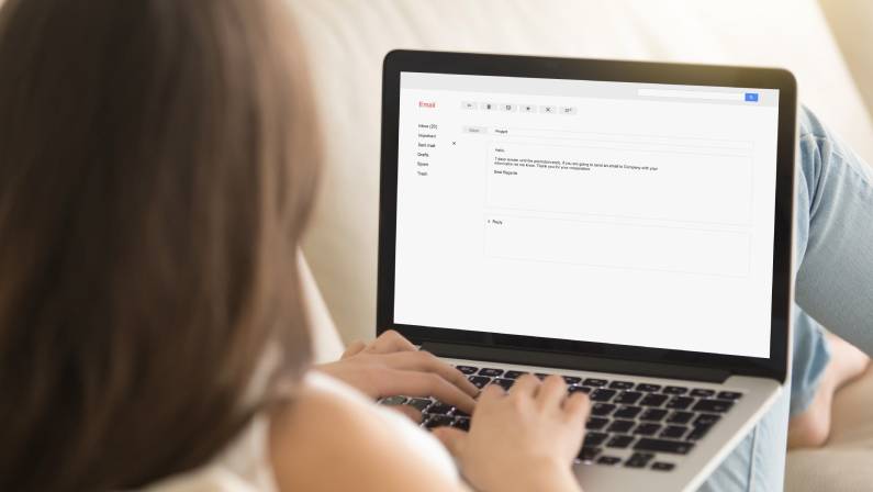 Woman typing electronic message