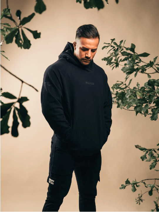 man wearing Alphalete sweatshirt