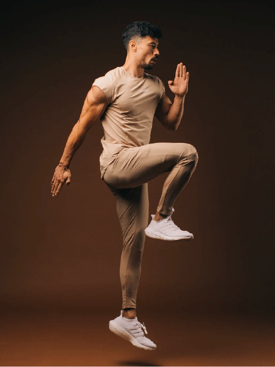 man wearing Alphalete Athletics tee and pant